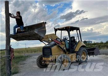 CAT 414E Багери
