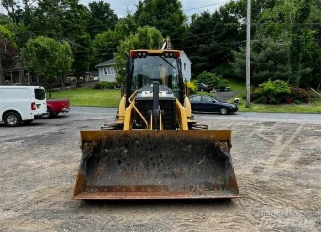 CAT 450F Товарач със заден ексватор