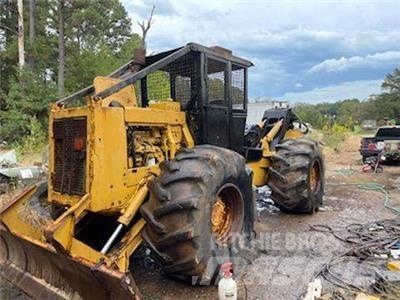 CAT 518 Скидери
