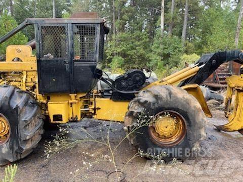 CAT 518 Скидери

