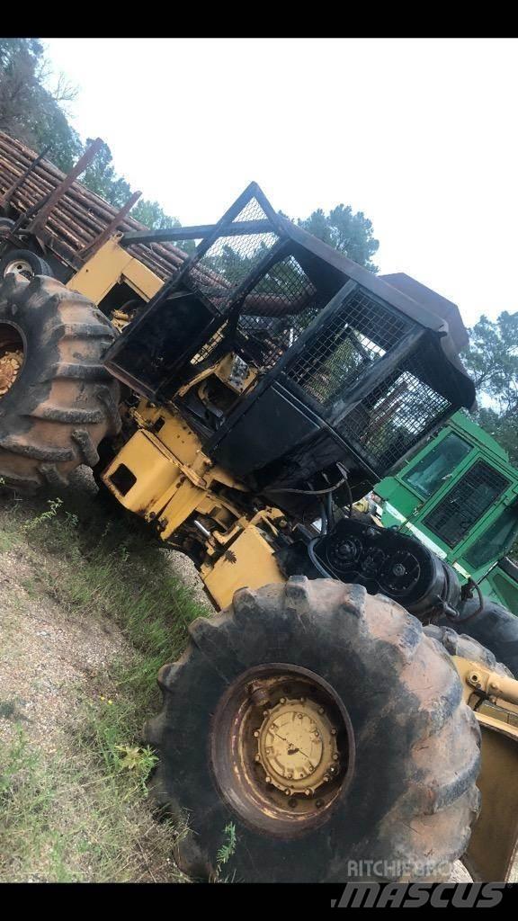 CAT 518 Скидери
