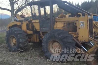 CAT 518 Скидери
