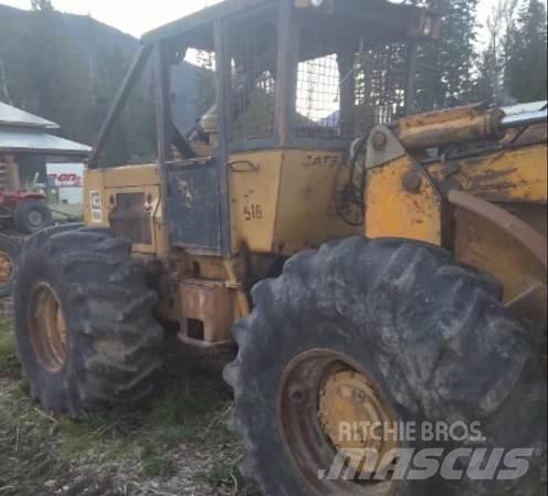 CAT 518 Скидери

