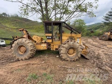 CAT 518 Скидери
