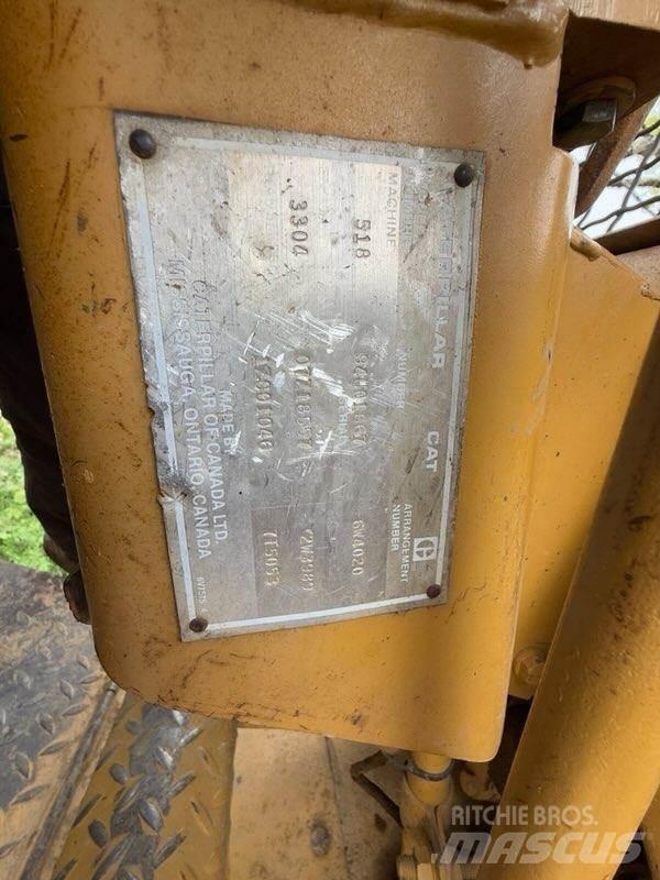 CAT 518 Скидери

