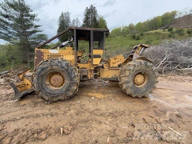 CAT 518 Скидери
