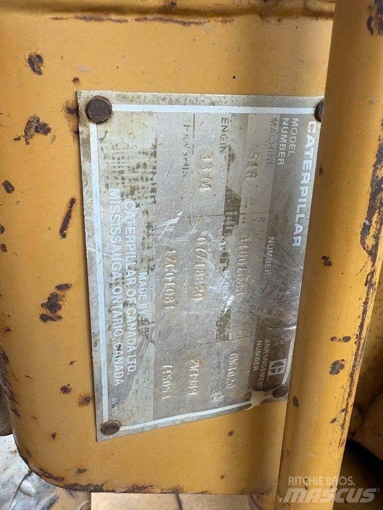 CAT 518 Скидери
