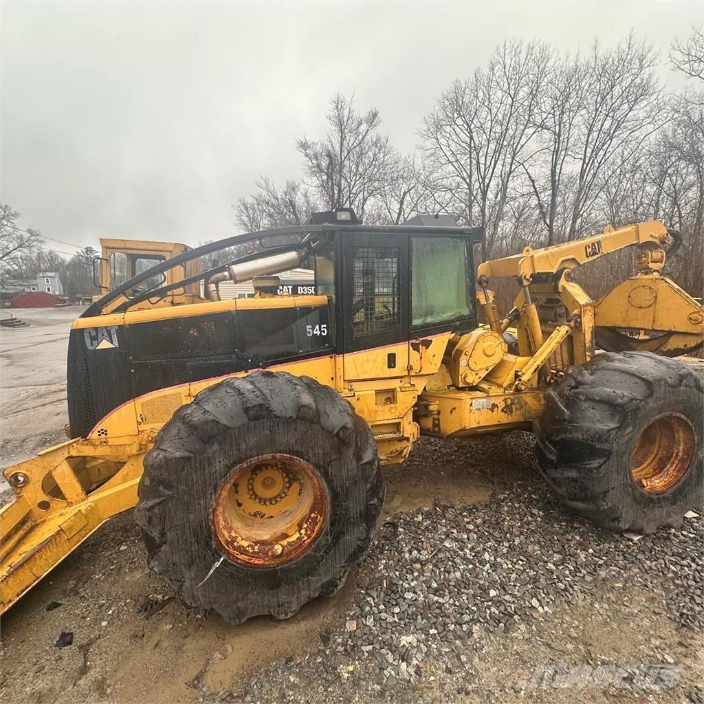 CAT 545 Скидери
