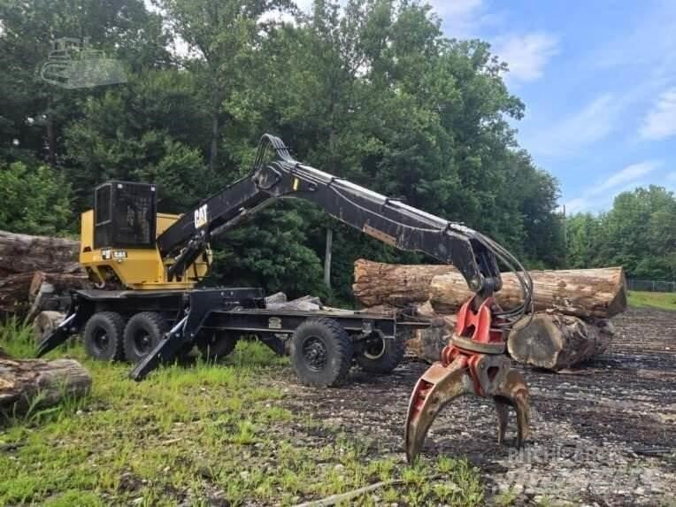 CAT 559C Товарачи с наклонена стрела
