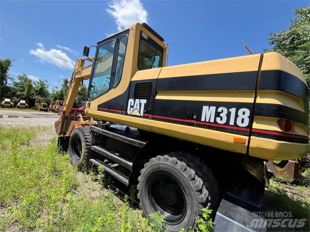 CAT M318 Колесни екскаватори