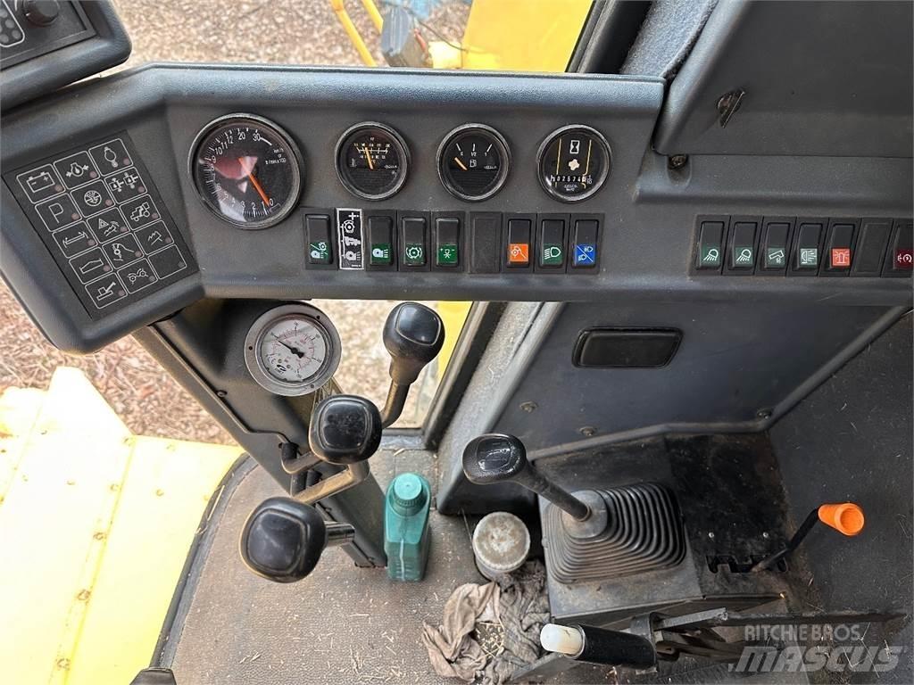 New Holland TC56 Комбайни