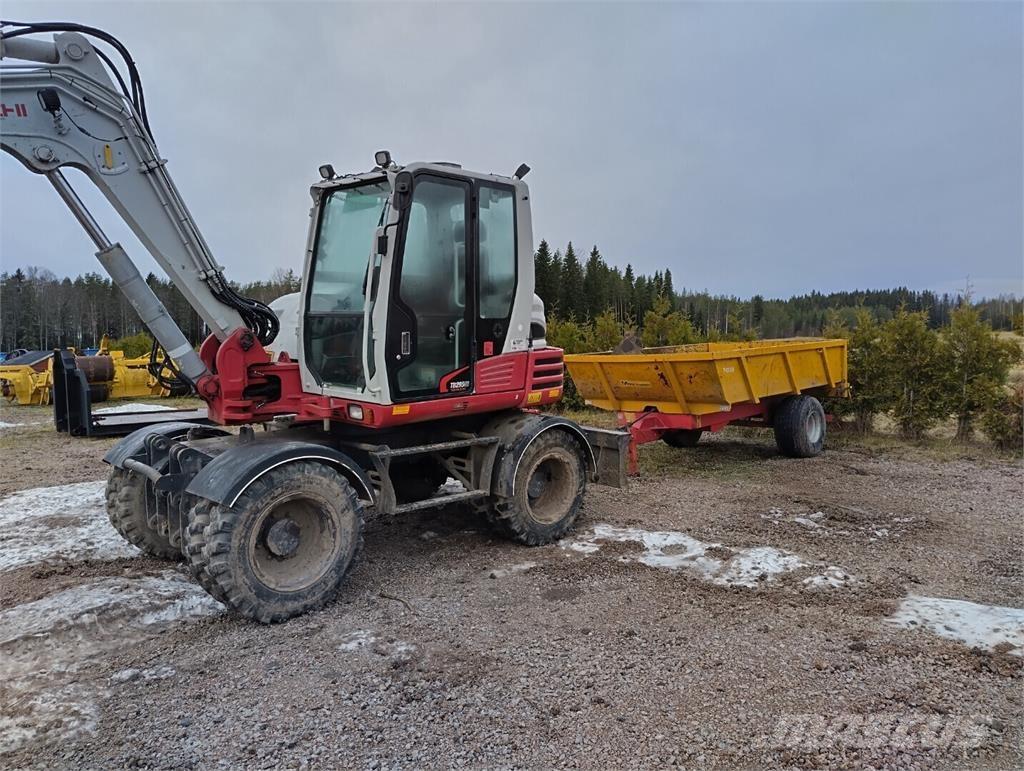 Takeuchi TB295W Колесни екскаватори