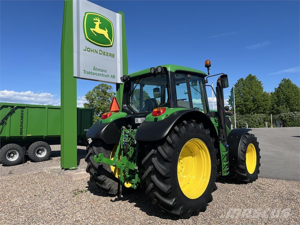 John Deere 6125M Трактори