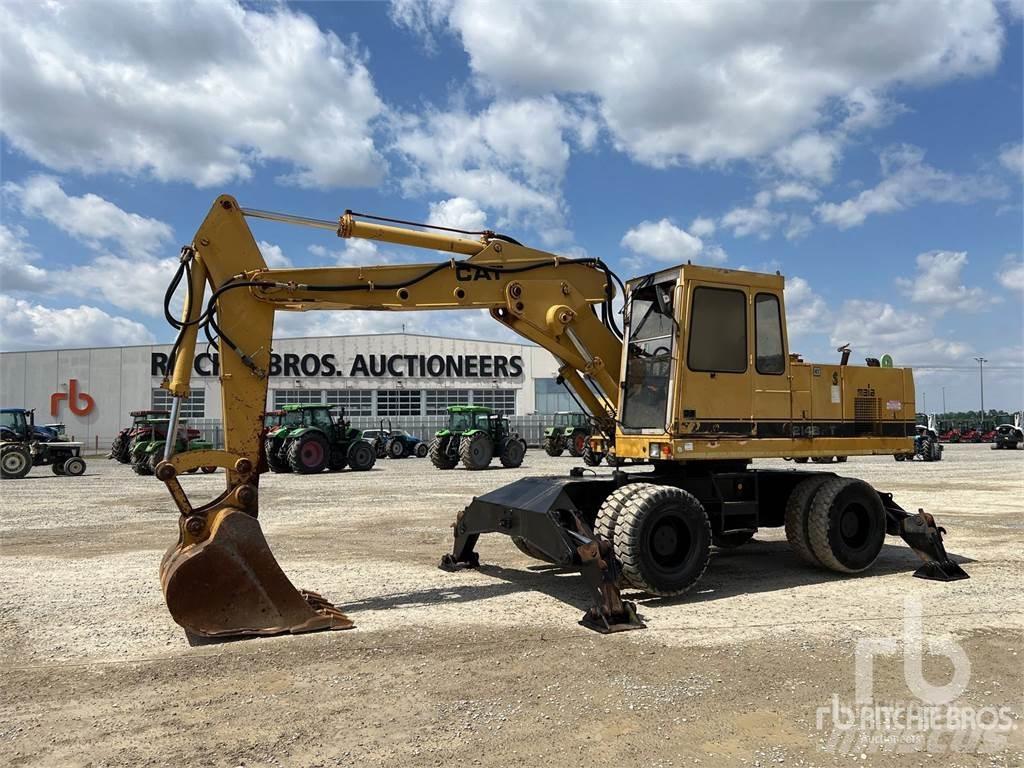 CAT 214BFT Колесни екскаватори