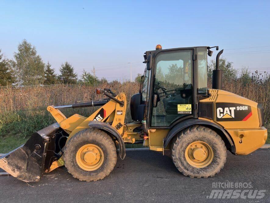 CAT 906H Багери