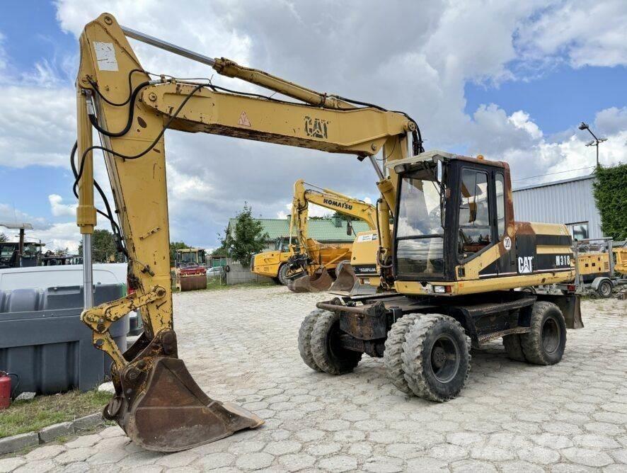 CAT M318 Колесни екскаватори