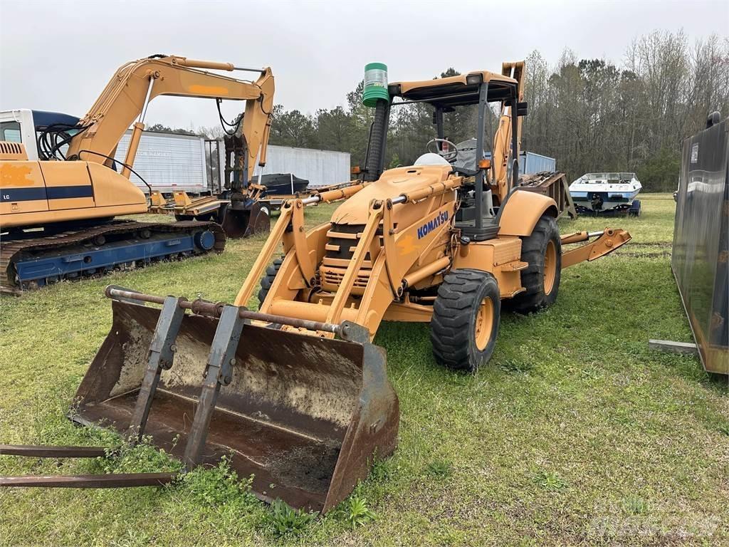 Komatsu WB140 Товарач със заден ексватор