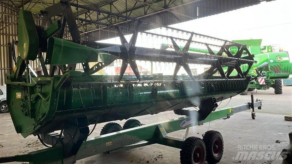 John Deere T 550 Комбайни